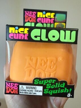 NeeDoh Nice Cube Glow Super Solid Squish - Orange Glow in the dark